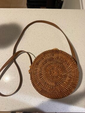 Round Woven Crossbody Bag in Brown